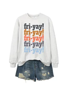 Close-up detail of casual grey long sleeve sweatshirt featuring colorful fri-yay text print.