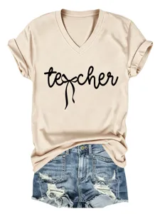 T-shirt femme décontracté col V manches courtes beige avec joli texte teacher et nœud.