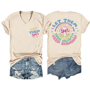 Casual V-neck short sleeve graphic t-shirt with denim shorts detail view for women fashion.