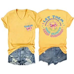 Casual women's yellow v-neck short sleeve t-shirt with inspirational back print and denim shorts.