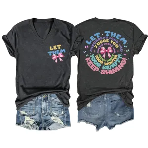 Detail view of dark grey V-neck short sleeve t-shirt with inspirational graphic text print.