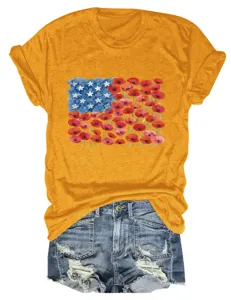 Detail view of casual women's yellow short sleeve t-shirt featuring floral flag graphic.