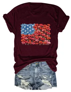 Women short sleeve crew neck t-shirt featuring floral flag graphic paired with denim shorts.