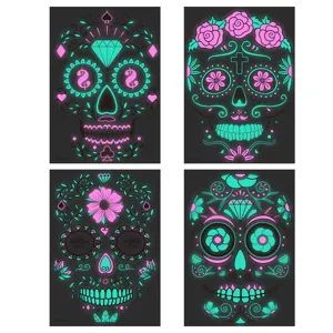Halloween luminous face tattoo stickers featuring vibrant sugar skull designs for parties.