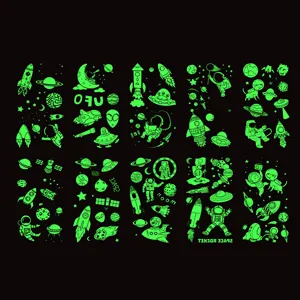Glow in the dark space temporary tattoo stickers for kids, cute cartoon astronaut rocket sheet.