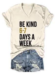 Casual women V-neck short sleeve tee in cream color with stylish letter print and rolled cuffs.