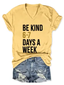 Detailed view of the casual yellow v-neck short sleeve t-shirt with print for women.