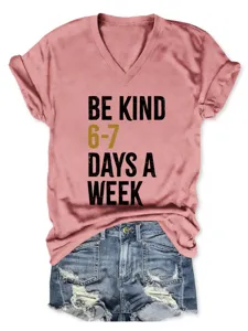 Detailed view of women casual V-neck short sleeve T-shirt with motivational graphic print.