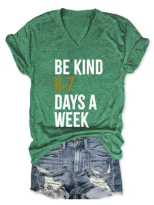 Detailed shot of the green V-neck short sleeve t-shirt with inspirational letter print.