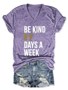 Casual women v-neck short sleeve t-shirt detail view, comfortable summer graphic tops.