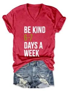 Casual red v-neck short sleeve t-shirt for women with letter print and denim shorts flat lay.