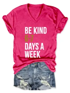 Pink V-neck short sleeve tee with graphic text detail, casual everyday summer style.