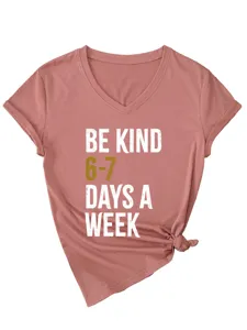 Casual women's V-neck short sleeve t-shirt with graphic slogan print and stylish tied hem detail.