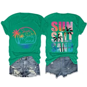 Women's green short sleeve t-shirt and denim shorts set with trendy beach typography print.