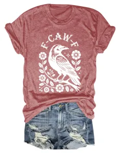 Close-up detail of women's short sleeve crewneck t-shirt with crow and floral graphic print.