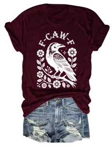 Detailed view of casual burgundy crow graphic t-shirt with short sleeves and round neckline.
