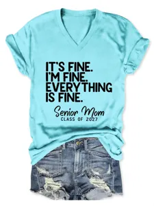 Light blue V-neck short sleeve T-shirt paired with denim shorts, casual everyday style.