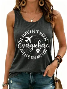 Detailed shot of the dark gray sleeveless tank top featuring a travel slogan print.