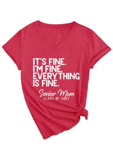 Close-up detail of red V-neck t-shirt with white slogan graphic print and side knot design.
