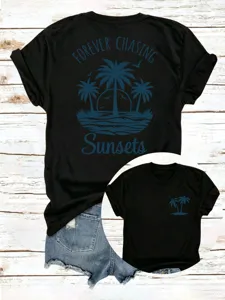 Damen schwarzes Kurzarm T-Shirt lässig lose Palmen Sonnenuntergang Grafik Oberteil