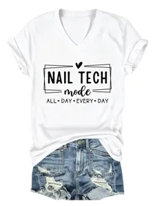 White V-neck short sleeve T-shirt with graphic print detail, paired with denim shorts.