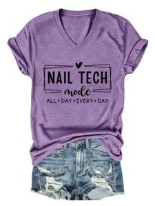 Purple V-neck short sleeve tee featuring nail tech print and stylish rolled cuffs detail.