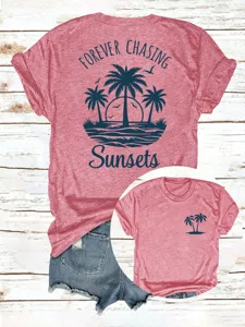 Detailansicht lässiges Damen Heather Rosa Kurzarm T-Shirt mit Palmen Sonnenuntergang Print.
