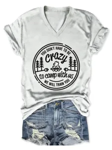 Women's white V-neck short sleeve t-shirt with camping graphic print casual top style.