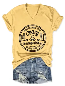 Women V-neck short sleeve T-shirt with camping graphic print paired with denim shorts.