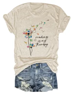 Casual short sleeve t-shirt featuring a unique reading dandelion book graphic and quote.