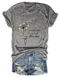 Casual women's grey round neck short sleeve t-shirt with creative book dandelion print.