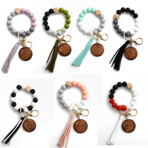 Silikonperlen Armband Schlüsselanhänger mit Lederquaste und MAMA Holzanhänger Set.