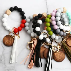 Silikon Perlen Schlüsselanhänger Armband mit Quaste und gravierter MAMA Holzperle Geschenk.