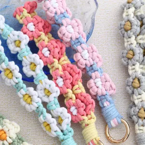 Handmade crochet daisy phone lanyard aesthetic woven wrist strap keychain charm detail view