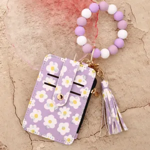 Lila Blumen Kartenetui Geldbörse Detail, Silikonperlen Armband und Leder Quasten Akzent.
