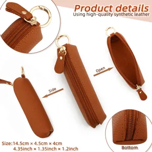 Detailed view of brown synthetic leather mini pouch keychain with gold zipper and ring.