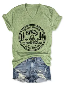 Casual heather green V-neck short sleeve T-shirt with camping graphic print for women.