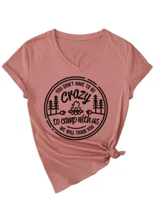 Close-up detail of the stylish V-neck short sleeve t-shirt with side knot and camping print.