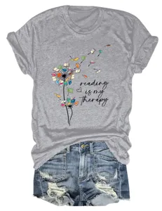 Detail view of casual grey short sleeve t-shirt featuring creative reading book dandelion print.