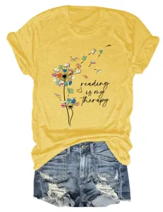 Casual yellow graphic t-shirt featuring reading dandelion print and comfy short sleeves.