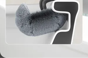 Detail view of the curved toilet brush featuring dense bristles for thorough corner cleaning.