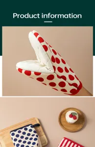 Detailed view of kitchen oven mitts featuring red and white polka dot design heat resistant.