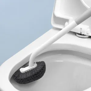 Long handle toilet brush for deep cleaning and bathroom cleaning, curved head design.