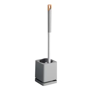 Ergonomic long handle toilet brush with square drainage holder for efficient bathroom cleaning.