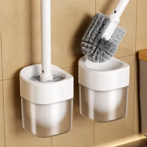 Wall-mounted toilet brush set with long handle and holder for modern bathroom cleaning.