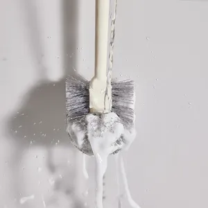 Household long-handled toilet brush with soft bristles for efficient bathroom cleaning.