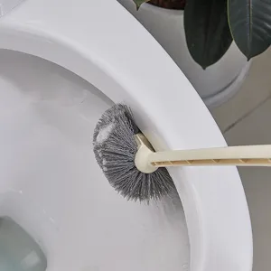 Long handle toilet brush with soft bristles for bathroom cleaning and wall mounted storage