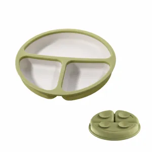 Assiette à ventouse en silicone pour bébé avec trois compartiments et base antidérapante.