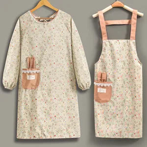 Lindo juego de delantal de cocina floral y bata de manga larga con bolsillo de orejas de conejo.