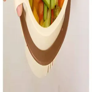 Close-up detail of hanging kitchen sink drain basket filtering vegetable food scraps efficiently